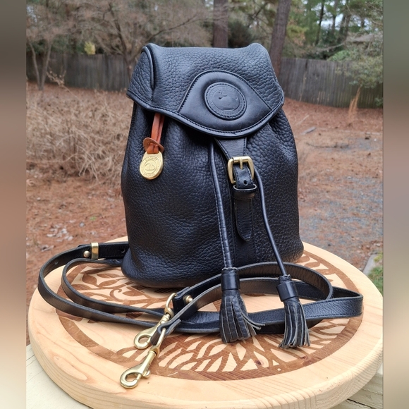 Dooney & Bourke Handbags - Vintage Dooney & Bourke Black AWL Pebbled Leather Mini Canyon Backpack